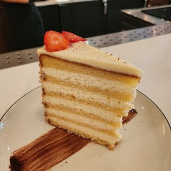 Benne’s - 12 layer coconut cake  Incredible taste, cake itself was dry. - Desserts Near Me - Charleston, South Carolina