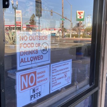 Sunny Donuts - a no parking sign in the window - Donuts Near Me - National City, California Sunny Donuts - a no parking sign in the window - Donuts Near Me - National City, California