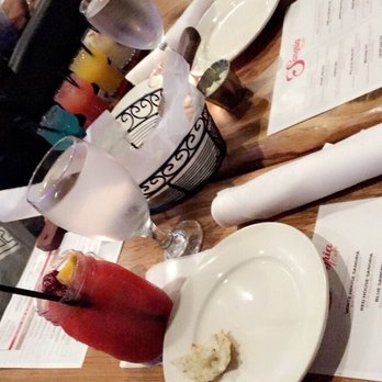 Sangria Cafe - Strawberry sangria, and my brother across the table with the sangria flute - Latin American Near Me - Bronx, New York Sangria Cafe - Strawberry sangria, and my brother across the table with the sangria flute - Latin American Near Me - Bronx, New York