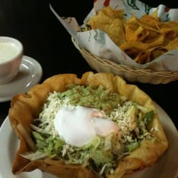 La Cascada Mexican Restaurant - Taco salad, chips, and small cheese dip.