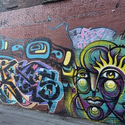 A bit of street art in the alley. A bit of street art in the alley.