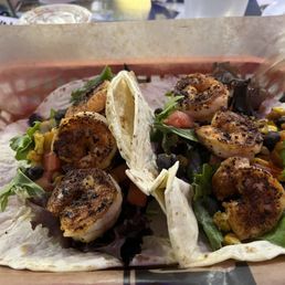 Blackened shrimp tacos on flour tortillas