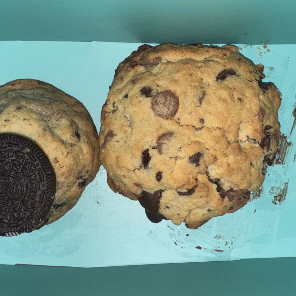 Potomac Cookie - Chocolate chip cookie next to an oddly small Oreo cookie - Desserts Near Me - Gaithersburg, Maryland Potomac Cookie - Chocolate chip cookie next to an oddly small Oreo cookie - Desserts Near Me - Gaithersburg, Maryland