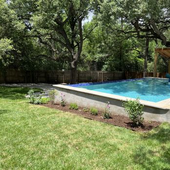 House to House - a pool in a backyard - Lawn Services Near Me - Austin, Texas