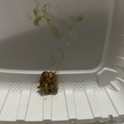Long hair tangled in the meat.