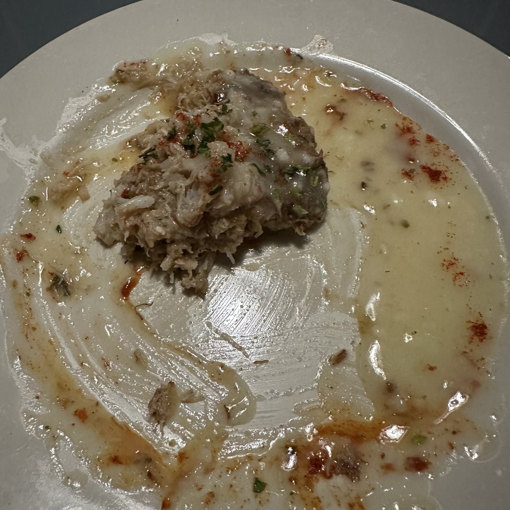 Monte’s Steak & Seafood - Crab cake, burnt on bottom, mush throughout - Steakhouses Near Me - Brandon, Mississippi