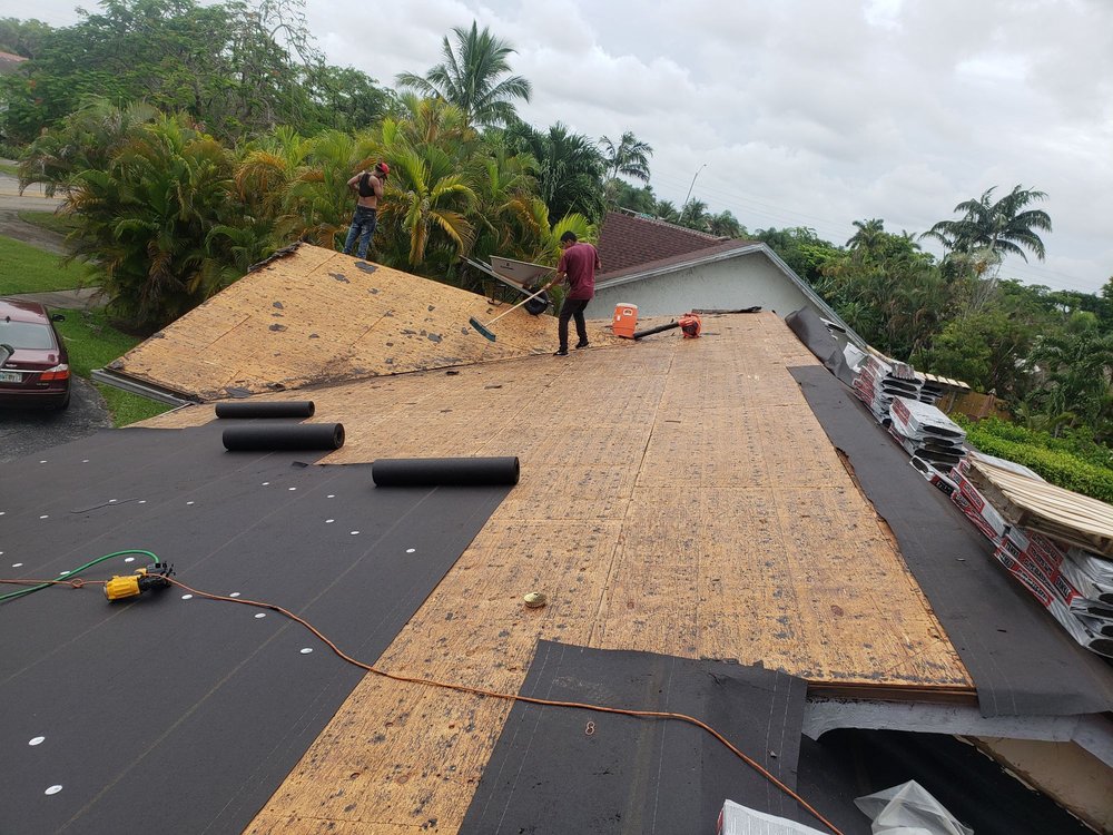 Slide of Dynasty Roofing