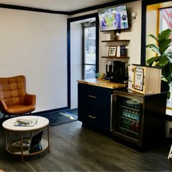 Pensacola AC & Auto Service Center - Comfy lobby/Waiting area with snack drawers, beverages, dog treats, and a Little Free Library!