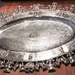 Sam's work on our family heirloom. You'd never know from looking at the photo that two of the figurines around the edge had broken off! Sam's work on our family heirloom. You'd never know from looking at the photo that two of the figurines around the edge had broken off!