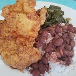 Fried pork chop. Really good. The greens were great too, punch of vinegar and hot sauce.