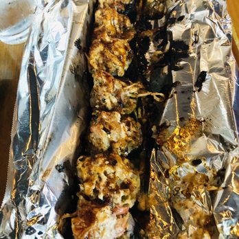 Arigatai Sushi - The Arigatai Fuego Roll inside (after flaming) - Japanese Near Me - North Miami, Florida