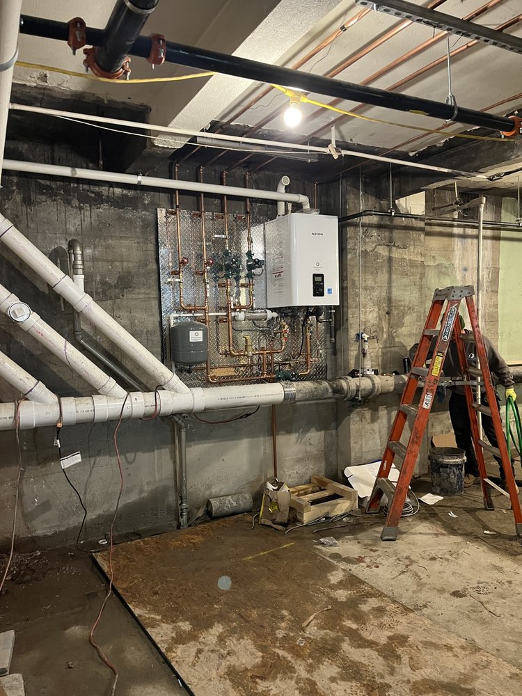 Slide of MJS Plumbing & Heating