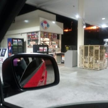 Food4Less - a view of a gas station from inside a car - Grocery Near Me - Barstow, California