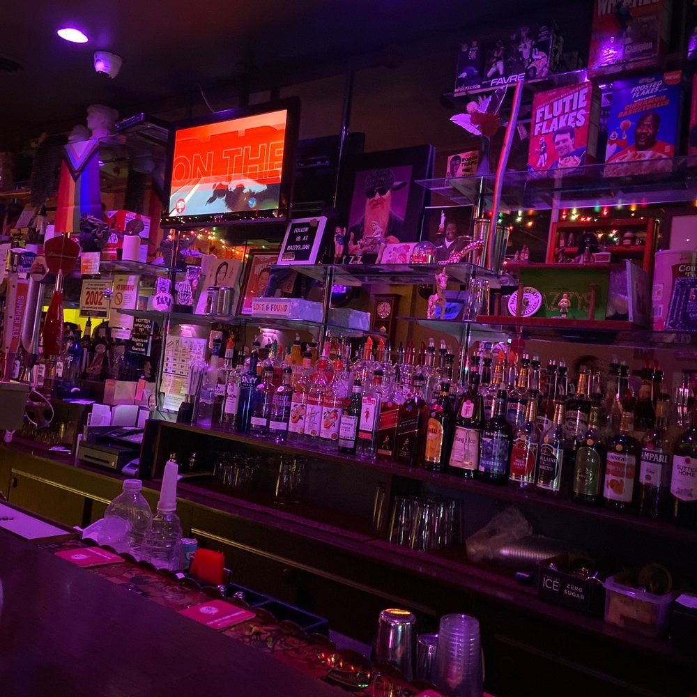 Mazzys - a dimly lit bar with a television in the background - Sports Bars Near Me - Mount Vernon, New York Mazzys - a dimly lit bar with a television in the background - Sports Bars Near Me - Mount Vernon, New York