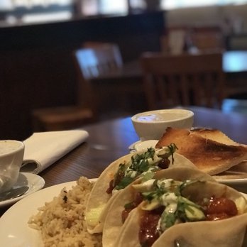 Fish City Grill - Honey chipotle shrimp tacos. It's three corn tortillas, cilantro, shredded carrots, celery, ranch dressing and diced avocado. - Seafood Near Me - Edmond, Oklahoma