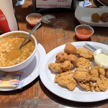 Shrimp N Stuff - Gumbo with a la carte fried oysters and some yummy hush puppies that I stole from my dad's plate. - Seafood Near Me - Galveston, Texas Shrimp N Stuff - Gumbo with a la carte fried oysters and some yummy hush puppies that I stole from my dad's plate. - Seafood Near Me - Galveston, Texas