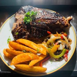 Yannelas Restaurante Km 42 - T bone steak was bomb.com
