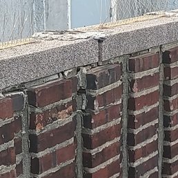 Bronstein Properties - Broken/Loose Bricks + Missing/Broken Mortar. 84-53 Dana Court, Middle Village Queens. Bronstein Properties when will this be fixed? - Real Estate Services Near Me - Forest Hills, New York