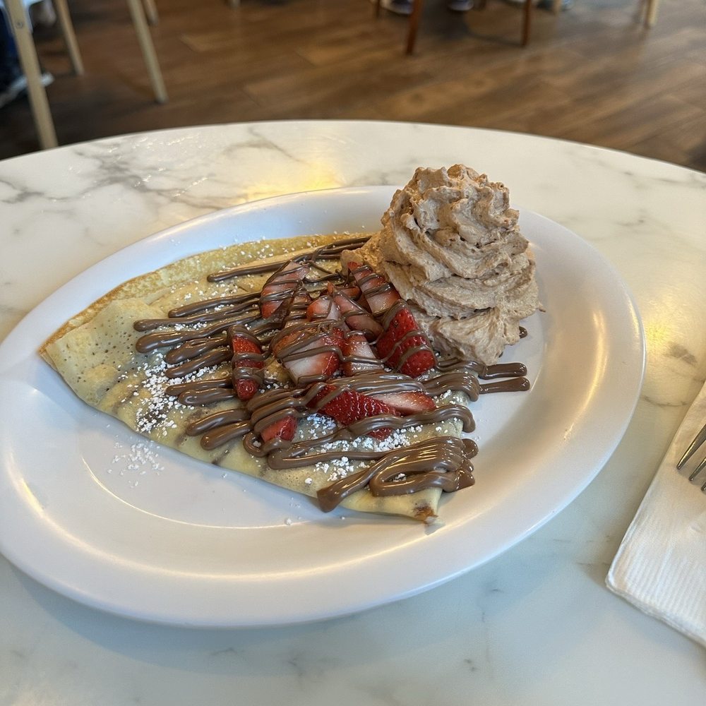 Nutella Cafe - Nutella crepe with strawberries - Desserts Near Me - Chicago, Illinois Nutella Cafe - Nutella crepe with strawberries - Desserts Near Me - Chicago, Illinois