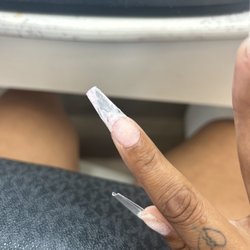Luxi Nails & Spa - The very little pink powder they had put on but wiped off