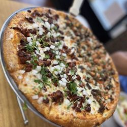 Combo's Pizza - Al pastor and carne asada pizza.