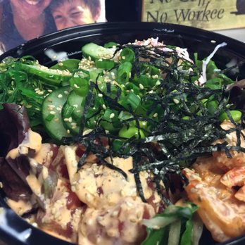 Poke Pop - brown rice & spring mix topped with spicy mayo ahi & shrimp, seaweed salad, crab meat, edemame, cucumber, dried seaweed & sesame seed. - Poke Near Me - Fircrest, Washington