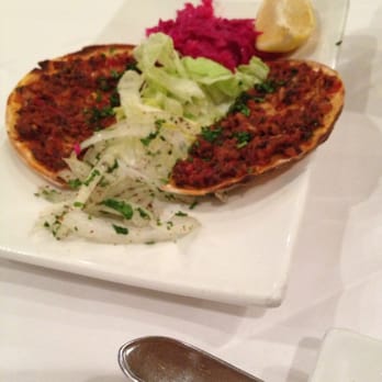 Nazif's - Lahmacun( laah- maa-june) thin crust dough topped with minced meat ( lamb or beef) blended with finely chopped garlic,onions etc - Turkish Near Me - Houston, Texas Nazif's - Lahmacun( laah- maa-june) thin crust dough topped with minced meat ( lamb or beef) blended with finely chopped garlic,onions etc - Turkish Near Me - Houston, Texas