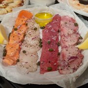Photo of Swan Oyster Depot - San Francisco, CA, United States. sashimi with capers, olive oil, and lemon
