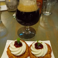 Bij Ernst - A typical Dutch cookie called a "Kletskop" with on top  fresh goat cheese and fig confiture served with a small glass of Bokbier.