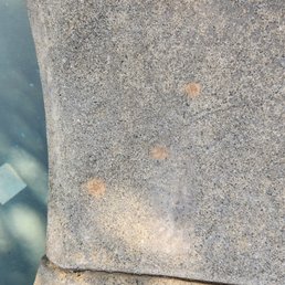These are brown cement stains left on my cement. These are brown cement stains left on my cement.