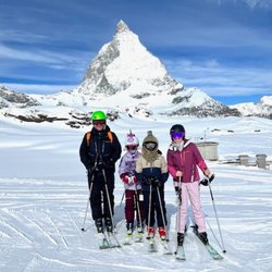 Dedham Bike - We offer ski and snowboard tuning! 
This is Matt and family skiing in Zermatt, Switzerland.