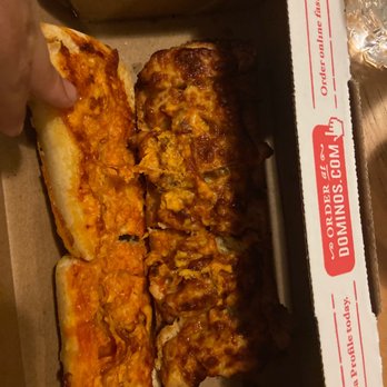 Domino's Pizza - a hand grabbing a piece of pizza - Pizza Near Me - Woonsocket, Rhode Island Domino's Pizza - a hand grabbing a piece of pizza - Pizza Near Me - Woonsocket, Rhode Island