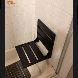 Ultimate Handyman - shower chair instillation