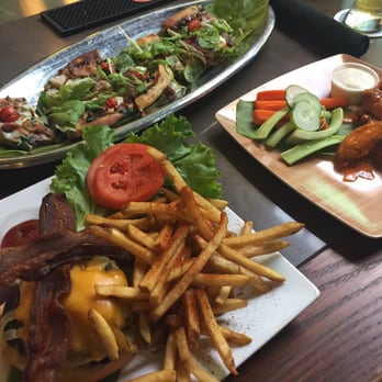 Windward Bar - Flatbread special, bacon burger with Cajun fries, & buffalo wings! - Pizza Near Me - Kailua, Hawaii Windward Bar - Flatbread special, bacon burger with Cajun fries, & buffalo wings! - Pizza Near Me - Kailua, Hawaii