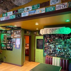 Pk's Irish Pub - Dart board and rest rooms. Very clean and pub like feel. Great view of river and good selection of drafts on tap. Guinness of course !