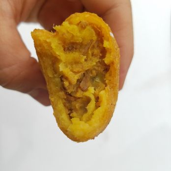 El Carretero Restaurant - Orange you glad I showed you the inside of this amazing empanada - Sandwiches Near Me - Union City, New Jersey