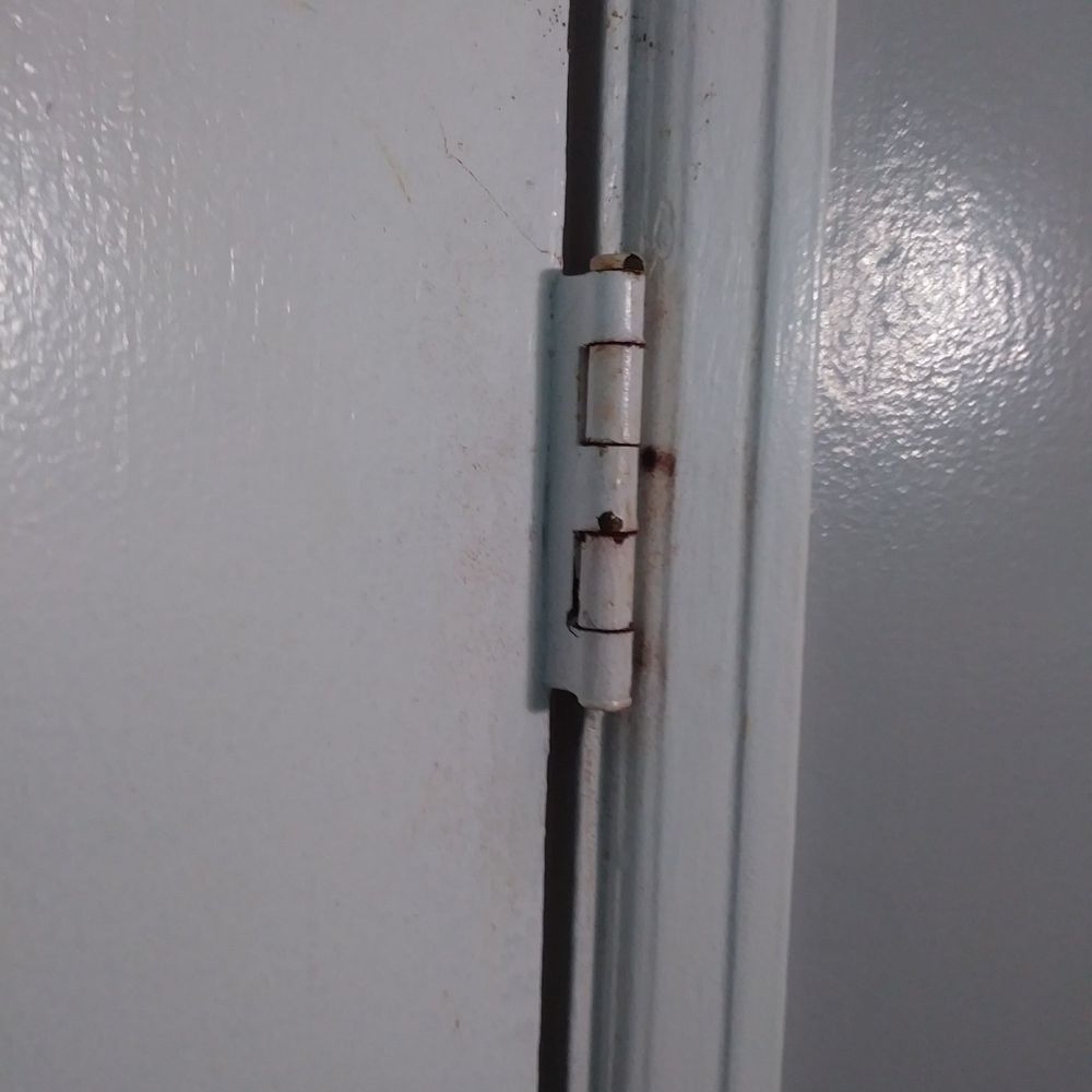 Calafia Inn - The rusted, squeeky door hinge gives the room a "rustic" ambiance. - Hotels Near Me - San Clemente, California Calafia Inn - The rusted, squeeky door hinge gives the room a "rustic" ambiance. - Hotels Near Me - San Clemente, California