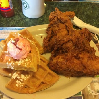 Metro Diner - Fried chicken and waffles with strawberry butter. Juicy chicken- I asked for all white meat and it was delicious - Breakfast & Brunch Near Me - Jacksonville, Florida
