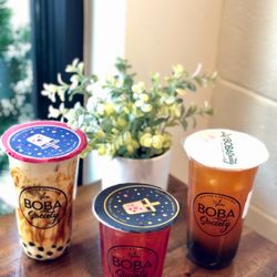 Boba Society - Tiger Sugar Milk Tea, Peach-Strawberry Tea with fruit bits, Pineapple-Mango Tea with fruit bits.