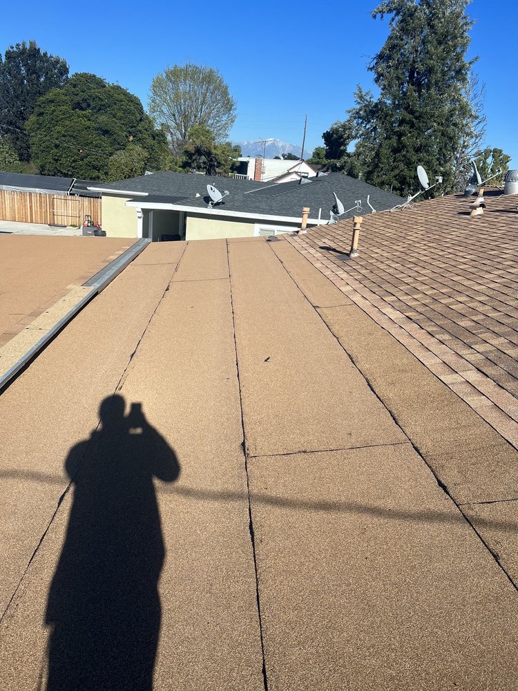 Slide of Alpha Roofing Group