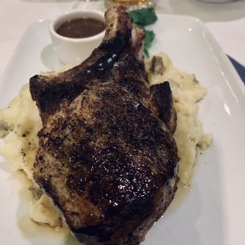 The ChopHouse - Pork chop with Mashed Potatoes. Absolute must get value item. Cooked medium in pic. Could even do mid-well - Steakhouses Near Me - Gibbsboro, New Jersey The ChopHouse - Pork chop with Mashed Potatoes. Absolute must get value item. Cooked medium in pic. Could even do mid-well - Steakhouses Near Me - Gibbsboro, New Jersey