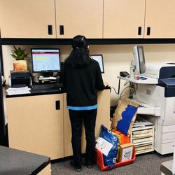 The UPS Store - Rude employee who refused to release my package and threatened to call the police.