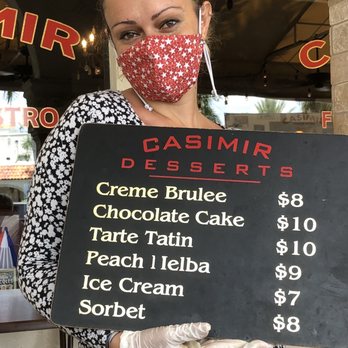 Casimir French Bistro - Manager Elena with the dessert list today... - French Near Me - Boca Raton, Florida Casimir French Bistro - Manager Elena with the dessert list today... - French Near Me - Boca Raton, Florida