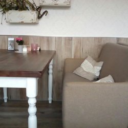 Sonja's Kuchenstübchen - Man sitzt auf bequemen Sofas