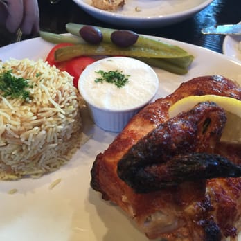 Ali Baba Mediterranean Grill - Half roasted chicken with saffron rice and awesome garlic dipping sauce. - Mediterranean Near Me - Richardson, Texas Ali Baba Mediterranean Grill - Half roasted chicken with saffron rice and awesome garlic dipping sauce. - Mediterranean Near Me - Richardson, Texas