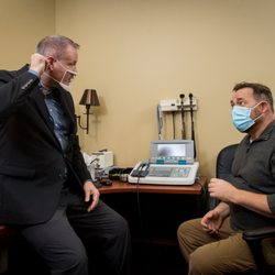 Lifestyle Hearing of Utah - Dr. Larsen explaining hearing loss to a patient