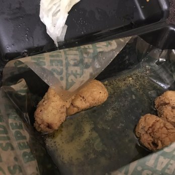 Wingstop - One of the many paper towels used to soak oil out of one wing alone - Chicken Wings Near Me - Palmdale, California Wingstop - One of the many paper towels used to soak oil out of one wing alone - Chicken Wings Near Me - Palmdale, California