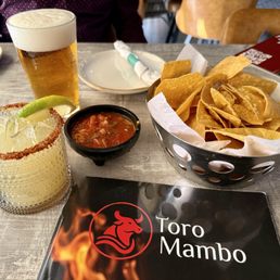 Chips & salsa with a spicy watermelon margarita Chips & salsa with a spicy watermelon margarita