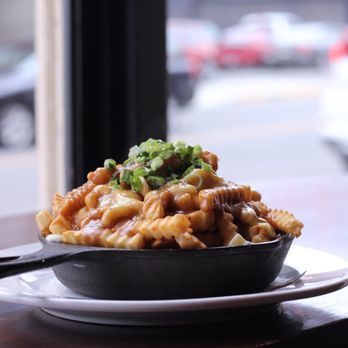 Swans Pub - a bowl of pasta with broccoli on top - Pubs Near Me - Victoria, British Columbia
