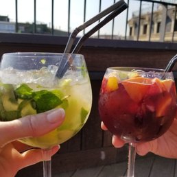 Drinks at the roof top pool and bar. Sangria and a Mojito. Drinks at the roof top pool and bar. Sangria and a Mojito.